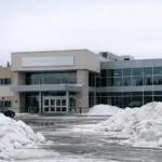 Thompson Council Endorses NHR CEO Office Move - AI Generated Image