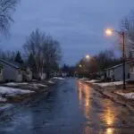 Thompson RCMP Seize Drugs, Two Firearms and $5,000 in Cash at Brandon Crescent Residence, Four Arrested on Apr 1 - AI Generated Image